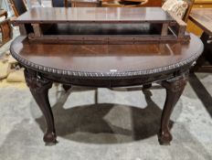 Victorian mahogany oval extending dining table, with gadrooned moulding, on four acanthus carved