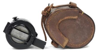 T G Co Ltd 'London' military compass, 1945 MKIII, no.340457, in brown leather case, stamped 'F