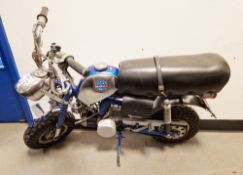 Vintage petrol Benelli mini bike made in Italy, with chrome and blue tank and chrome decoration