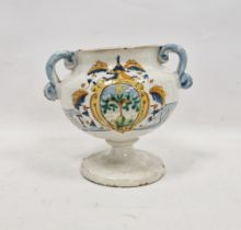 Italian maiolica armorial two-handled footed vase-shaped albarello, probably 17th century, with blue