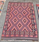 Afghan kilim, woven with a large field of lozenge pattern in pale pink, black and grey, on a dark