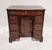 Georgian mahogany kneehole desk/dressing table having a central long drawer raised over a single