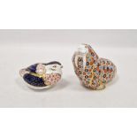 Two Royal Crown Derby bone china imari pattern paperweights, modelled as a quail and a walrus,