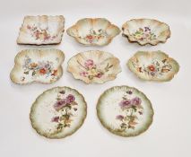 A Carlton Ware blush ivory ground part dessert service, printed marks, all with floral decoration (