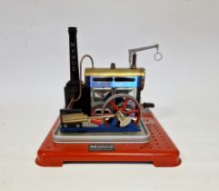 Mamod stationary steam engine on red Meccano base, 24cm wide and another, similar, 20cm wide (2)