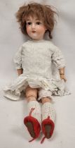 Recknagel (German) bisque head doll, early 20th century, numbered 24/R5A., Germany, with jointed