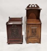 A Victorian stained wooden cabinet adorned with carved decoration throughout, measuring approx 102