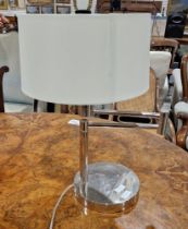 Contemporary Ralph Lauren chrome swing arm-style table lamp, model no. 164081, with original