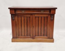 A Victorian mahogany chiffonier having a single long drawer with two brass handles raised over a two