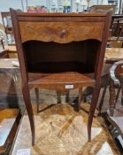 A early twentieth century mahogany bedside unit with quarter-veneered decoration to the top, a
