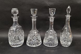 Four twentieth century cut glass decanters and stoppers, variously cut with stars, fans and
