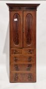 Early 20th century mahogany wardrobe comprising two doors, both of which decorated with flamed