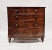 A Victorian flamed mahogany bowfronted chest of drawers comprising two short over three long