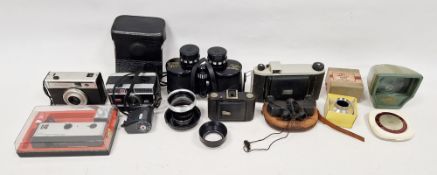 Collection of vintage cameras, binoculars and accessories, comprising Zeiss Ikon Ikonta, Kodak