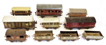 Two boxes of mainly Hornby O gauge goods and passenger rolling stock to include LMS open wagons,
