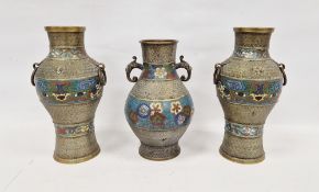 A garniture of three Chinese or Japanese cloisonne enamel vases, late 19th/early 20th century,