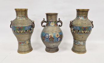 A garniture of three Chinese or Japanese cloisonne enamel vases, late 19th/early 20th century,