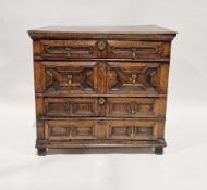 Antique oak, possibly late 17th century, chest of four long drawers, all with geometric moulding,