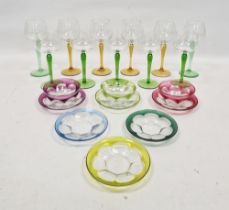 LOT WITHDRAWN Eleven 20th century coloured hock glasses, with coloured baluster stems in green and