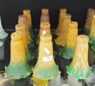 Collection of Art Nouveau amber and green opaque glass petal-shaped lampshades (12)