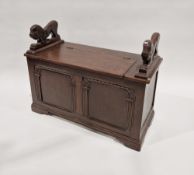 20th century stained wooden monks bench with carved arm rests in the form of prowling lions, 72cm