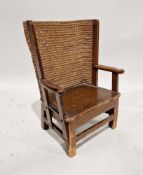 Late 19th/early 20th century pine child's Orkney chair, having woven rush seat back, 56cm high