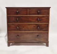 19th century mahogany chest of drawers having two short over three long drawers, each with turned