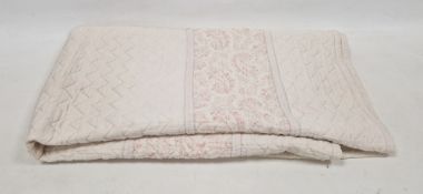 Mid twentieth century cotton quilt, printed in pink paisley pattern borders within white panels,