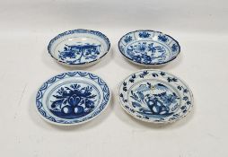 Four Dutch Delft small circular plates, 18th/early 19th century, each painted in blue with