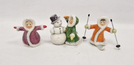 Three Goebel pottery figures emblematic of Winter, printed blue marks, painted and impressed