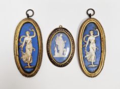 Three late 18th/early 19th century gilt-metal mounted jasper ware oval pendant plaques, probably