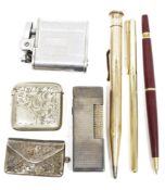 Edwardian silver stamp purse, a white metal acanthus engraved vesta case, a Ronson 'Whirlwind'