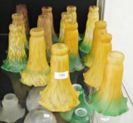 Collection of Art Nouveau amber and green opaque glass petal-shaped lampshades (15)