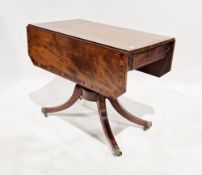 A 19th century mahogany drop leaf dining table with canted corners, raised on cabriole legs with