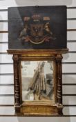 19th century giltwood and gesso armorial wall mirror, of rectangular form with two baluster and mask