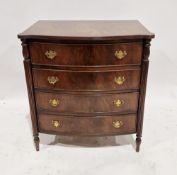 20th century reproduction chest of drawers comprising four long drawers, each with brass handles,