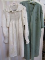 Early 20th century linen smock, with smocking to the bodice front and back and on the shoulders,