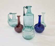 Small quantity of studio glass by Mark Taylor to include two jugs and four miniature vases, all