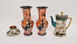 Pair of Carlton Ware vases, of baluster form, decorated with magpies on orange lustre ground, 21.5cm