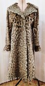 One 1960s ladies Ocelot fur coat with Cites certificate. Self-lined collar, 2 outer pockets, fastens