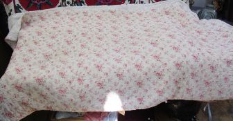 Mid 20th century reversible double quilt lined with wool, printed with pink flower sprays to one