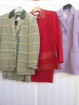 Paul Costelloe lilac-coloured trouser suit, a Claude Rap red crepe and leather skirt suit, an Admont