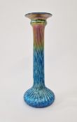 Steven Lundberg studio glass candlestick, iridescent blue and yellow colourway with ribbed exterior,