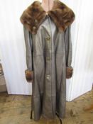 Vintage full length bronze/silver leather coat, with deep mink collar and cuffs to the sleeves,