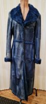 Escada blue distressed leather coat, lined and trimmed with blue rabbit fur, four clip fastenings,
