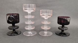 Four Wedgwood "Sheringham" glass candlesticks designed by Ronald Stennett-Wilson, to include a clear