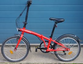 Red painted B-Twin folding bicycle