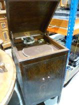 An early 20th century cabinet gramophone by HMV (50x46x93 cm)