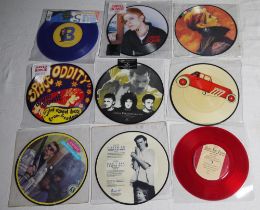 A collection of vinyl 7" 45 RPM coloured vinyl and picture disc singles from artists such as David