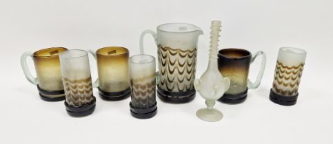 Group of 20th century Persian studio glass, circa 1970s, comprising three tankards, a jug (20cm